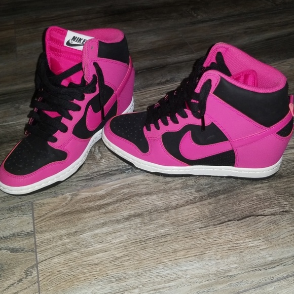 pink and black nike high tops